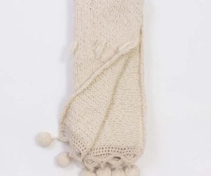 Amity home anya throw in ivory   pom pom trim