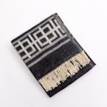 Amity home jaki throw in black  ivory   geometric pattern