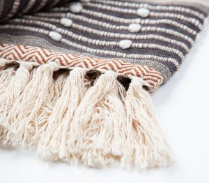 Amity home bati throw in grey terracotta  natural   textured bobble stripes