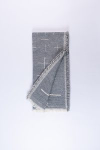 Amity home aron throw in grey   white cross pattern