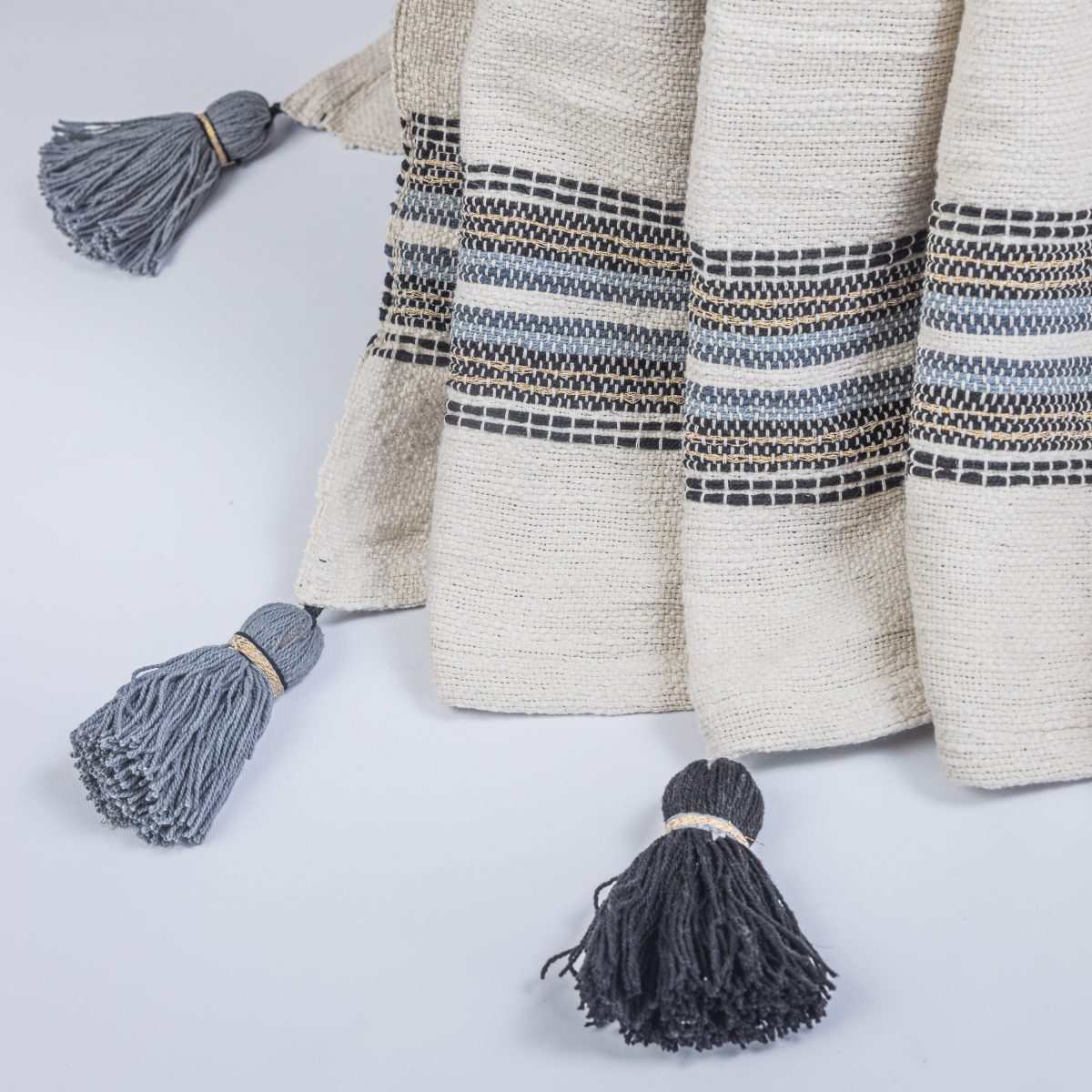 Amity home vera throw in natural with multi stripe   tasseled edges