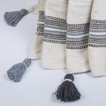 Amity home vera throw in natural with multi stripe   tasseled edges