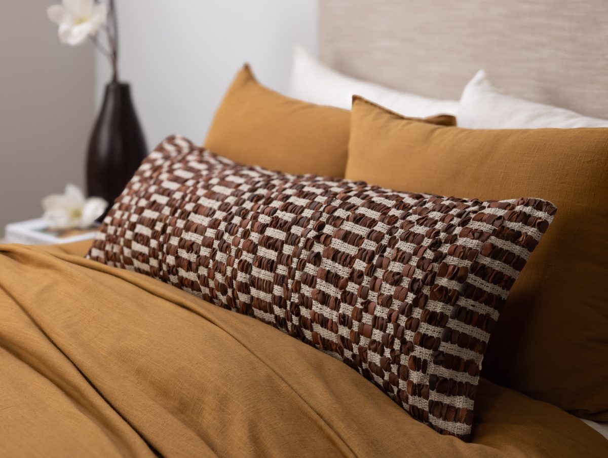 Amity home philips x long bolster in cognac   woven leather loops