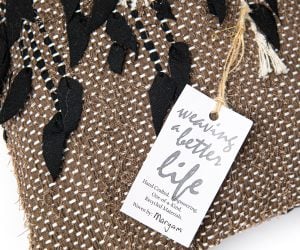 Amity home blakely bolster in bronze   appliqué fabric detail