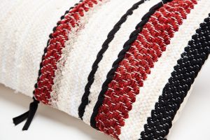 Amity home sullivan bolster in cream red  black   braided  woven stripes