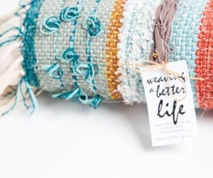 Amity home tallulah pencil bolster in teal orange natural   looped weave