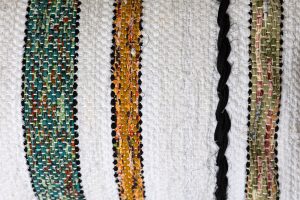 Amity home maryam bolster in ochre   textured woven stripes