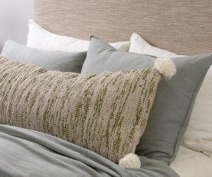 Amity home cecil x long bolster in beigeolive green   textured weave  pom poms