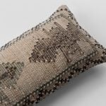 Extra long bolster pillow in handwoven kilim fabric with geometric motifs in taupe olive and espresso tones