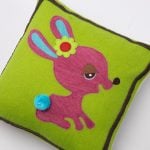Amity home bunny wool felt pillow in lime green   pink bunny appliqué