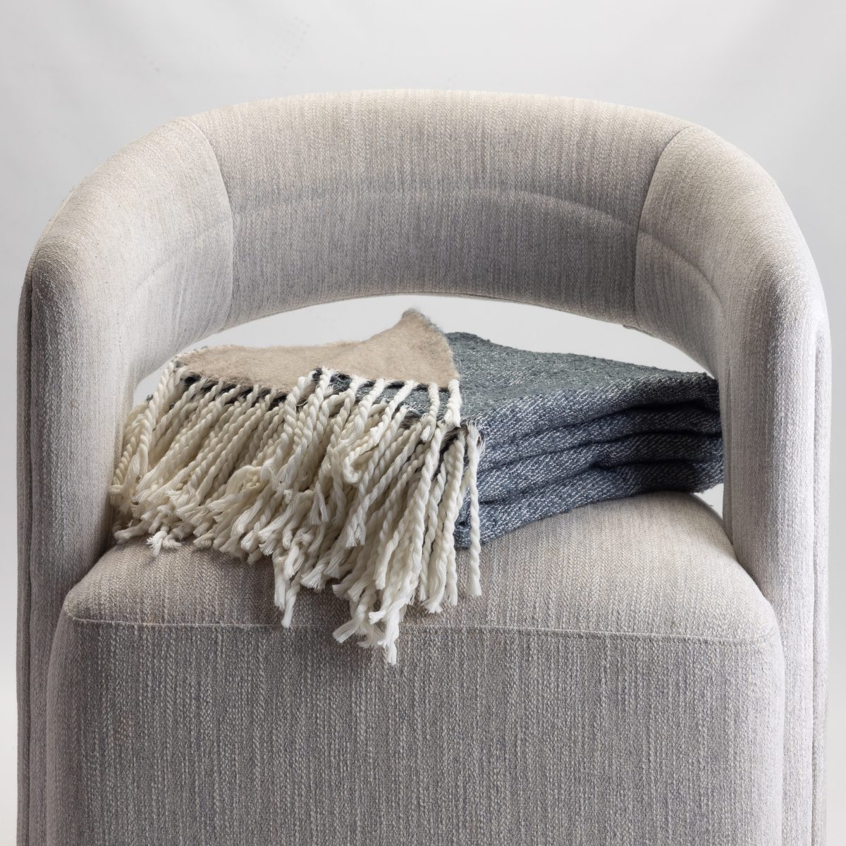 Amity home grant throw in adriatic   woven texture with fringes