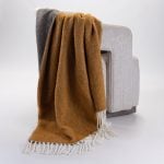Amity home grant throw in ochre   textured weave