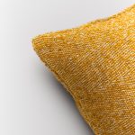 Amity home grant bolster in ochre   textured woven fabric