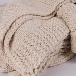Amity home micah cable knit throw in natural   chunky cable knit texture