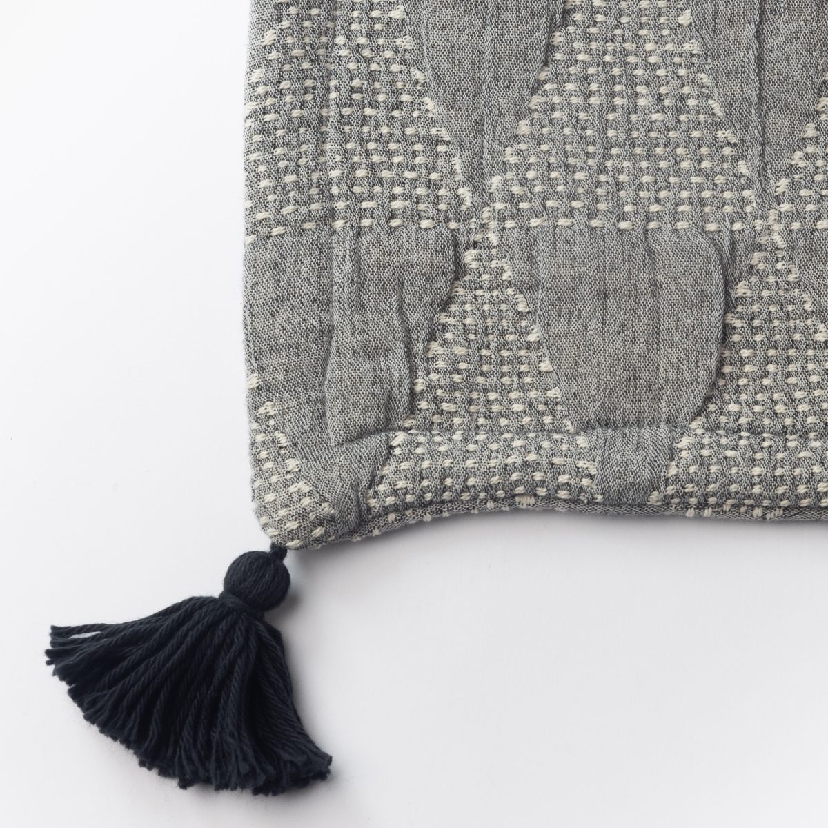 Amity home zion coverlet swatch in asphalt   textured weave with tassel