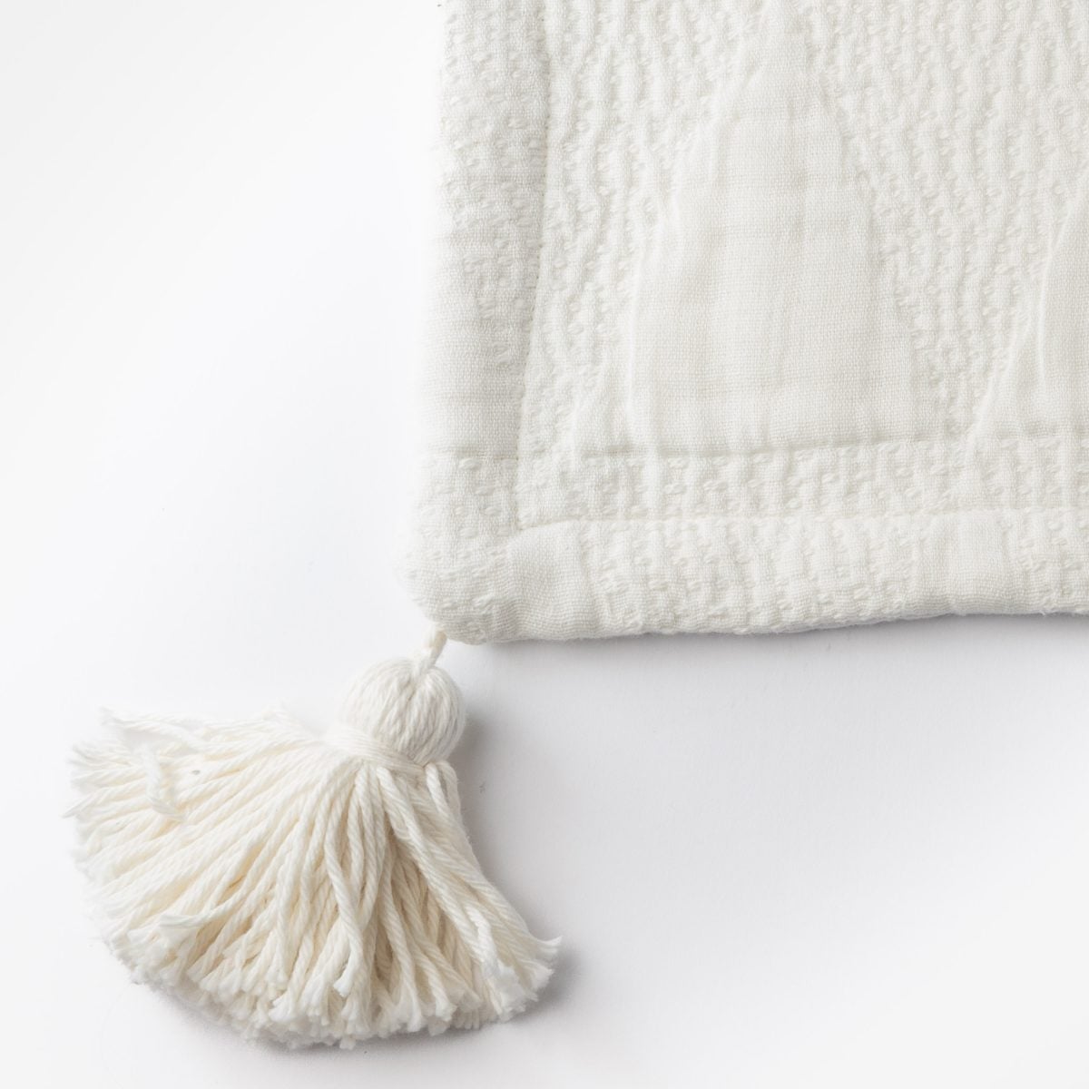 Amity home zion coverlet swatch in ivory   raised dot texture