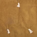 Amity home hawke quilt swatch in ochre   soft fabric with decorative tassels