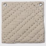 Amity home mendel quilt in earth   quilted with multi color dash stitches