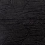 Amity home teton quilt swatch in black   subtle quilted texture