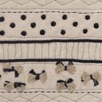 Amity home sitka quilt swatch in naturalblack   embroidered yarn bows