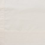 Amity home luxx sheet swatch in ivory   fine stitching detail