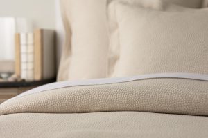 Amity home santiago matelasse in sandshell   raised dimpled texture