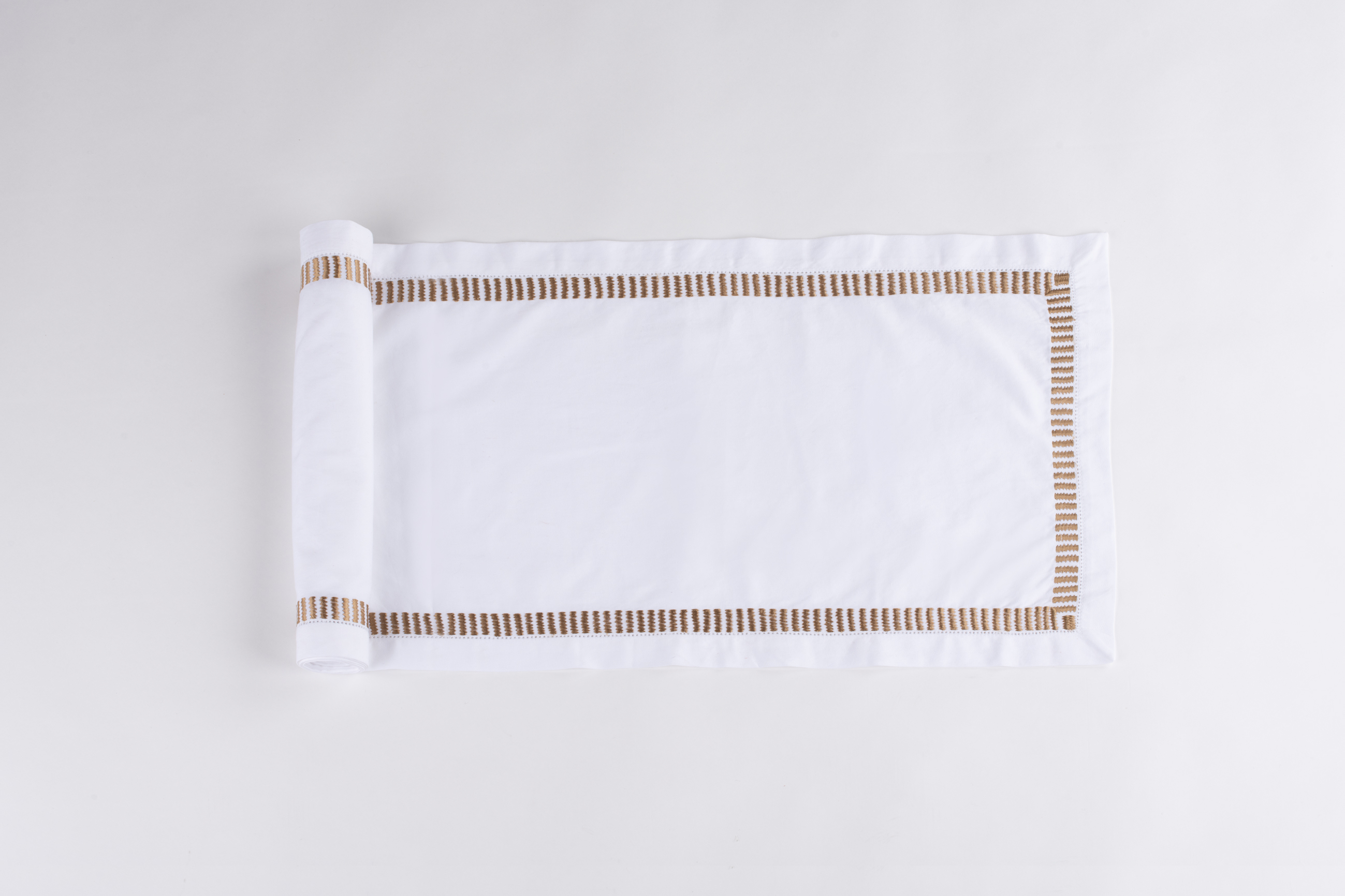 Tr1042c | Amity Home Amity home savona table runner in white with caramel embroidered border