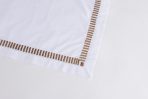 Amity home savona table runner in white with caramel   dash embroidered border