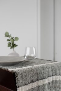 Amity home akin linen table runner in kale with off white stripes   fringed edges