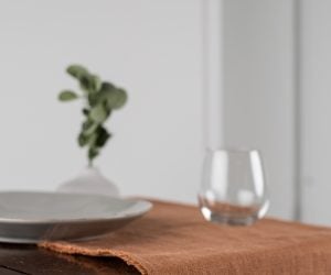 Amity home ranier linen table runner in ochre   frayed edges