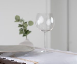 Amity home savona table runner in white with caramel   elegant embroidered border