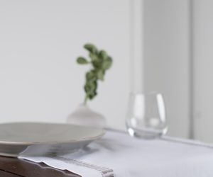 Amity home savona table runner in grey   decorative woven border