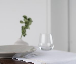 Amity home savona table runner in oyster   embroidered border detail