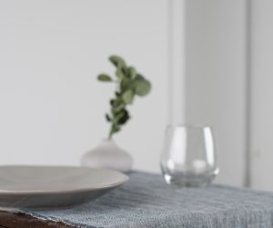 Amity home kent linen table runner in peacock   frayed edges