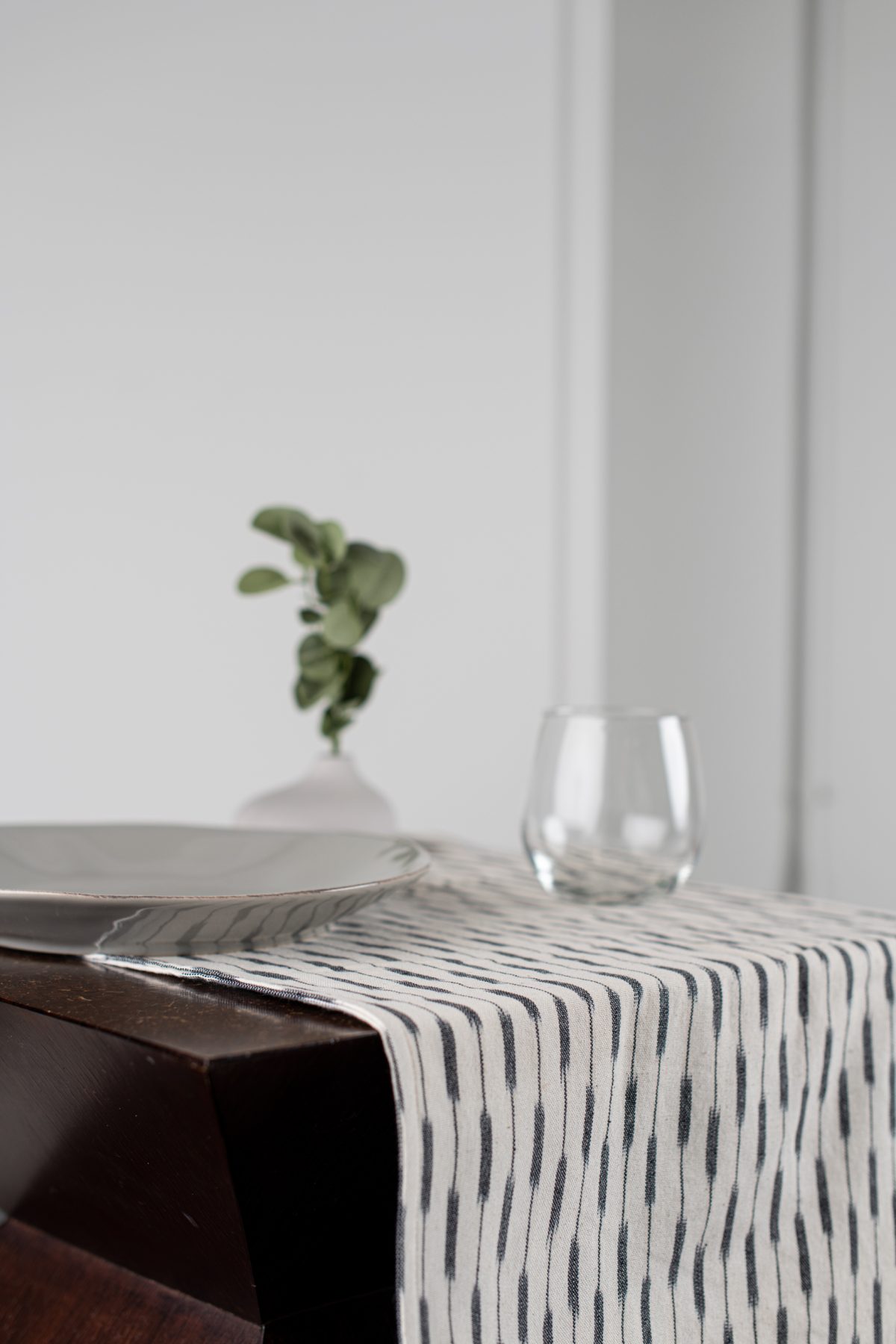 Amity home lana table runner in natural with black stripes   ikat pattern