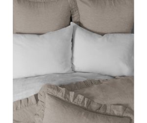Amity home basillo duvet cover   natural linen duvet cover and shams with ruffled edges on a styled bed