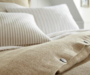Amity home jackson duvet cover in natural beige with a distinct herringbone weave and decorative button closure
