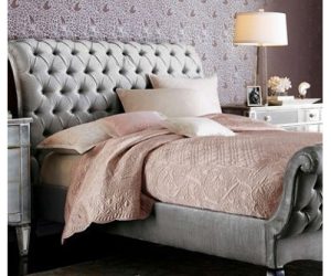 Amity home tudor quilt   pink luxury quilt with intricate quilted pattern draped on a styled bed